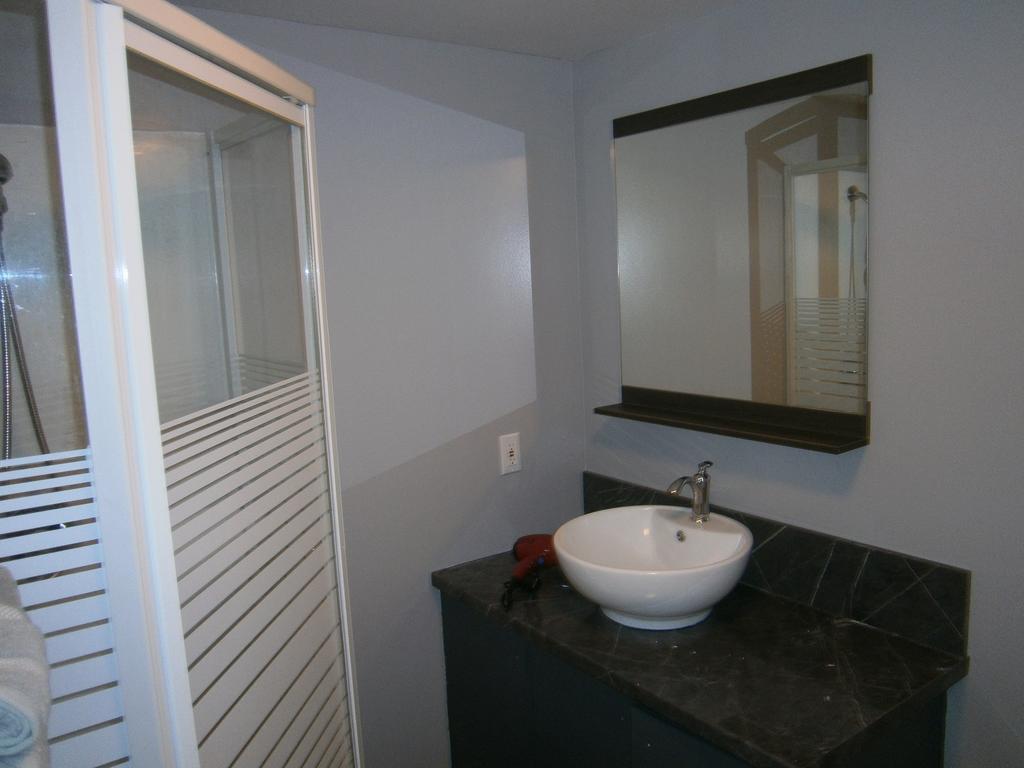 Sous Le Clocher De L'Anse Exterior photo